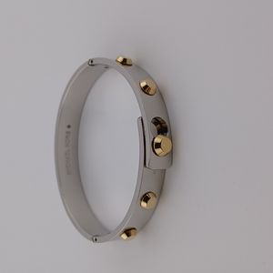Michael Kors bangle bracelet, two-toned.